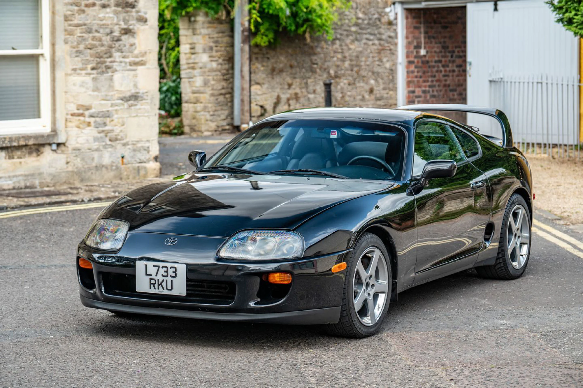 The black 1994 Toyota Supra Twin Turbo photographed in the UK for its auction listing